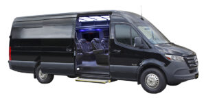 A black van with the door open and seats folded down.